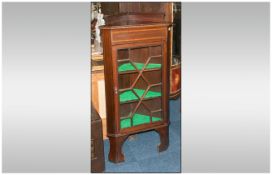 Edwardian Mahogany Inlaid Astral Glazed Standing Corner Cupboard of small size. Three interior