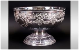 Sheffield Plated Hand Chased Punch Bowl with an embossed decoration of flowers. 12'' in diameter,