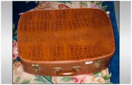 Faux Leather Crocodile Skin Suitcase, with brass lock plates. Maker 'Cheney'.