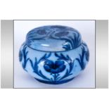 William Moorcroft Signed Florian Ware Blue on Blue Lidded Powder Bowl ' Poppy ' Design. c.1900-1906.