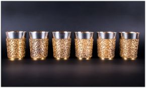 Stuart Devlin Fine Set Of Six Large Silver & Silver Gilt Beakers. Each beaker with a polished