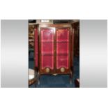 A French Linke Style Walnut Double Door Vitrine. Ormolu Mounted With Shaped Sides. The Central Doors