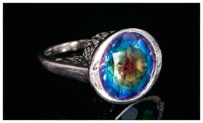 Rainbow Quartz and Diamond Ring, a large, round cut of 14.75cts of the unusually coloured quartz,