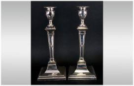 Pair Of Silver Plated Candle Sticks In The Adams Style, Raised Acanthus And Bead Decoration On