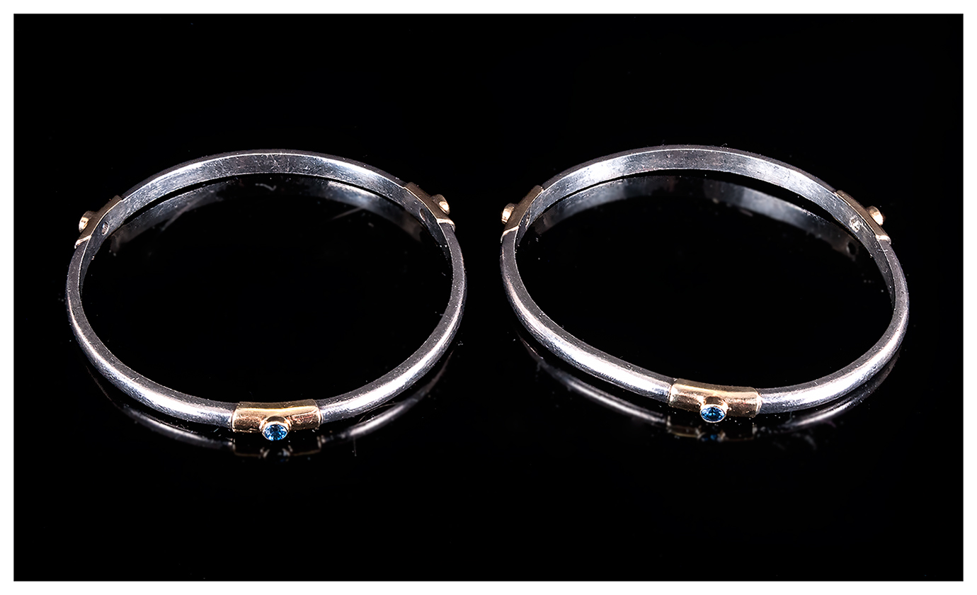 A Vintage Pair of Silver and Gilt Bangles - Set with Blue Sapphires In Gilt Mounts. Not Marked but - Image 2 of 3