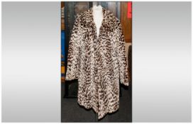 Ladies Three Quarter Length Ocelot Fur Coat, collar with revers, hook & loop fastening, fully lined,