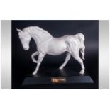 Beswick Horse Figure 'Spirit Of Freedom' model number 2689, raised on a rectangular wooden plinth.