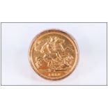 22ct Gold Half Sovereign Set In a 9ct Gold Shank. The Half Sovereign Is George V and Dated 1915. The