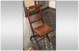 An Austrian Bentwood Style Folding Bar Chair with slatted back and pressed seat.