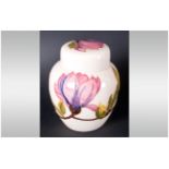 Moorcroft Magnolia Pattern Ginger Jar And Cover, the base with signature mark and impressed