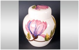 Moorcroft Magnolia Pattern Ginger Jar And Cover, the base with signature mark and impressed