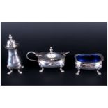 George VI Silver 4 Piece Cruet Set Raised on Spade Feet. Hallmark Birmingham 1940. Complete with