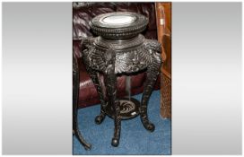 A Large Japanese Black Lacquered Pedestal with an Inset Grey Marble Top, Bordered with a Greek