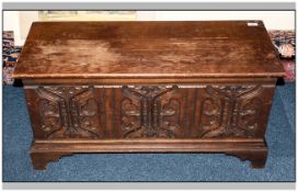 Small Carved Front Oak Coffer with Lift Up Lid, The Panel Carved In The Gothic Manner on Bracket