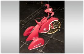 A Replica Childs Pink Painted Tin Pedal Bike, in the 1930's design. Made by Airflow Collectables Inc