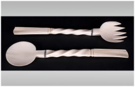 Pair of Vintage Carved Ivory Spoon and Fork, with a Twisted Grip Handle and Black Decorations.