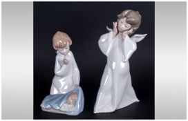 Lladro Figures ( 2 ) In Total. 1/ Mime Angel, Model Num.4959. Issued 1977, Height 8.5 Inches. Mint