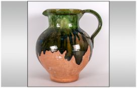 French Provincial Studio Pottery Jug. Top half brown & green drip glaze. Marked