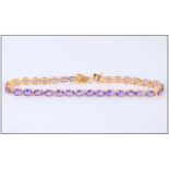 Purple Amethyst Tennis Bracelet, 12.75cts of oval cut amethyst set in a gold vermeil and silver