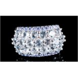 Aquamarine and Tanzenite Wide Band Ring, three rows of sparkling, round cut aquamarines, with a