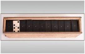 Set of Dominoes in original Box, ebony and bone.