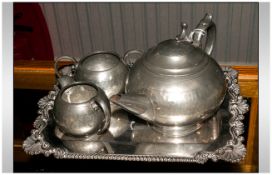Three Piece Pewter Tea Set Planished Decoration. Unmarked. Together With A Rectangular Silver Plated