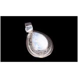 Rainbow Moonstone Pendant, a pear cut cabochon of rainbow moonstone, of 6cts, bezel set in a hand