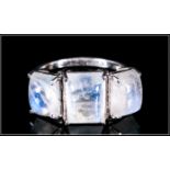 Rainbow Moonstone Trilogy Ring, the centre baguette cut cabochon of 4cts flanked by two further,