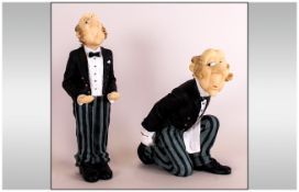 A Pair of Hand Painted Comical Butler Resin Figures. Heights 9 & 6.5 Inches.