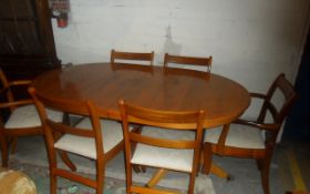 Light Wooden Dining Table With Six Matching Chairs