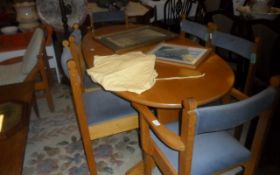 Light Wooden Oval Table With 6 Chairs