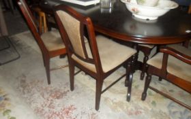 Dark Wooden OVal Table & 6 Chairs