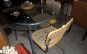 Glass Topped Table & Two Wicker Chairs