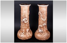 Pair Of Bretby Vases with a moulded dragon decoration to the body. Impressed number to base. 14'' in