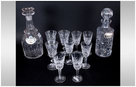 Two Glass Decanters with Whisky and Port Labels and Star Cut bases. With two sets of sherry/small