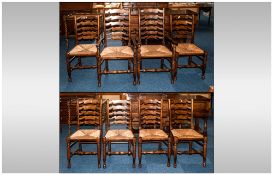 Set of Eight Reproduction Wavy Backed Rush Seated Ladder backed Chairs, on Shaped Pad Footed Legs,