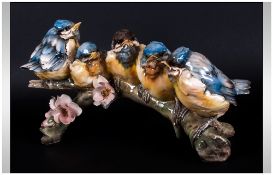 A Vintage Good Quality Hand Painted Porcelain Figure Group of Five Yellow and Blue Bird Figures In