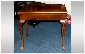 Edwardian Mahogany Card Table in the George II Style, with a lift up flap to expos a green beige