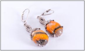 Bumblebee Jasper Pair of Drop Earrings, oval cabochons, each of 7.25cts, suspended below platinum