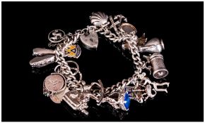 Vintage Silver Charm Bracelet, Loaded with 18 Charms. All Fully Hallmarked. 65.1 grams.