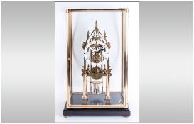 A Vintage and Impressive Quality Brass Cathedral Shaped Skeleton Clock with fusee movement. Circa