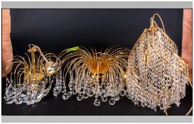 Three Crystal Gilt Metal Contemporary Chandeliers probably Italian with down shaped arms, carrying