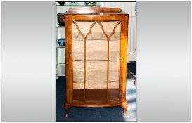 1930's Walnut Veneered Single Door Display Cabinet with arch shaped astral glazed doors to the front