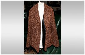 Mid Brown Curled Lamb Jacket fully lined, with slit pockets