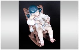 Lladro Figure 'Nap Time' Girl In A Rocking Chair Sleeping, model number 5448. Retired Sculpture. 4.