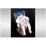 Lladro Figure 'Nap Time' Girl In A Rocking Chair Sleeping, model number 5448. Retired Sculpture. 4.