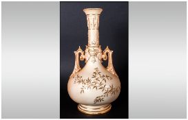 Royal Worcester Blush Ivory Two Handle Persian Style Vase. Date 1892. Stands 10 Inches High.