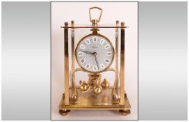 Brass German Anniversary Clock, 300 day with brass mounts and glazed sides.