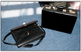 2 Black Briefcases, One Hard Cased, The Other Soft Leather