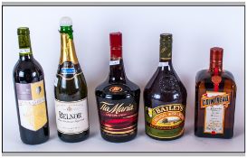 Selection of Unopened Alcohol Bottles comprising Cointreau, Belnor Sparking Perry. Tia Maria,